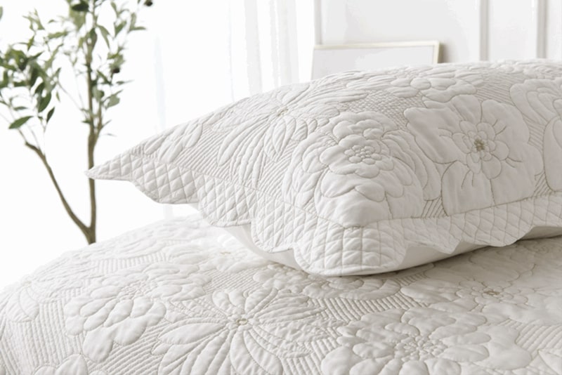 embroidered white decor pillows